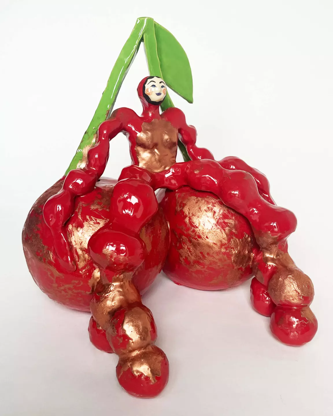 Malwine Stauss, On top of the cherry, 2023, Fired and glazed clay, epoxy resin, copper pigment, 37 × 38 × 30 cm